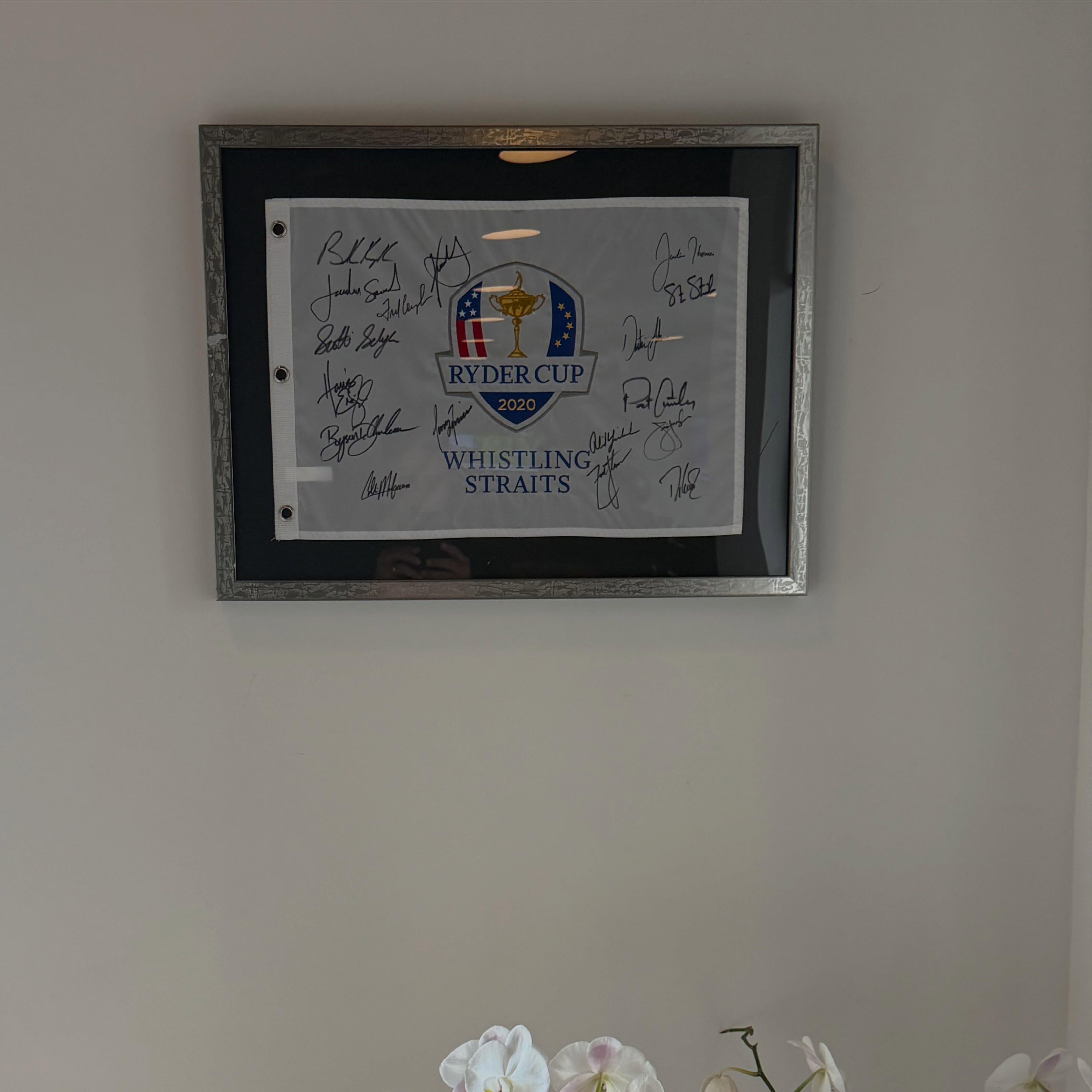 A little Ryder Cup history now hangs at Tee Box Delray. 🇺🇸🏆

A huge thank you to one of our Founding Members for donating this incredible signed flag from the 2020 Ryder Cup at Whistling Straits — played in 2021 — when Team USA defeated Europe 19–9, the United States’ most recent Ryder Cup victory.

Signed by members of that U.S. team and now proudly displayed at Tee Box Delray.

This is exactly what we love about the community we’re building. Our members continue to make Tee Box feel like more than a place to work on your game.

Pretty special piece of golf history to have in the Box.

GolfHistory