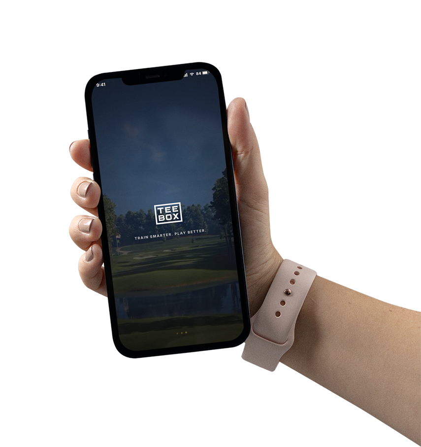 An image of a person holding their phone and app in their hand - explore the Tee Box of how-to videos.