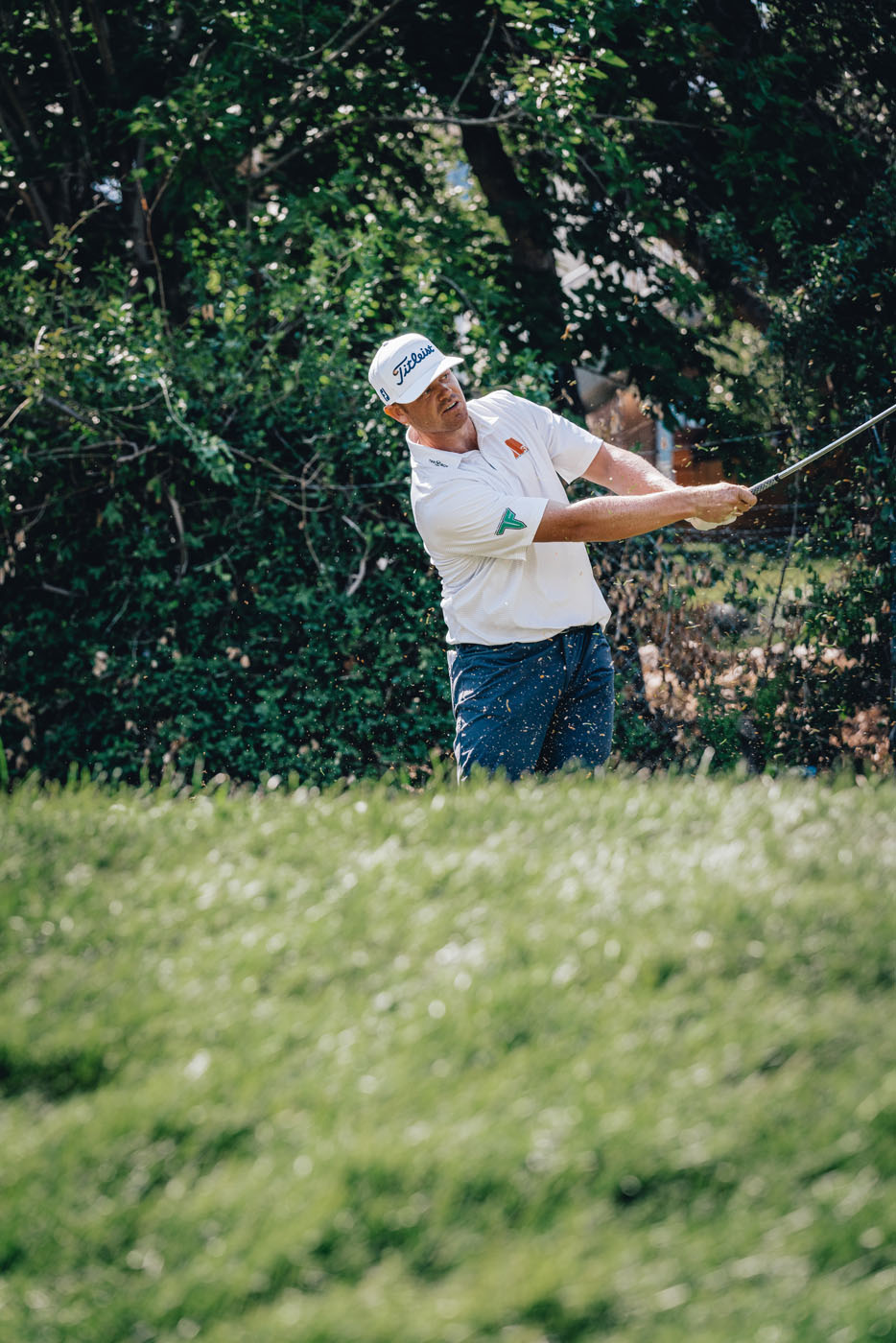 An image of athlete Patrick Fishburn hitting on the green - Tee Box Georgetown.