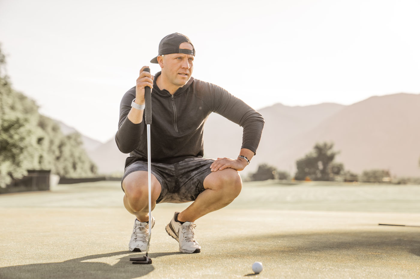 A golfer on the field working on overcoming his performance plateau - learn more about how to improve your game using data and coaching from Tee Box in Pittsburgh, PA!