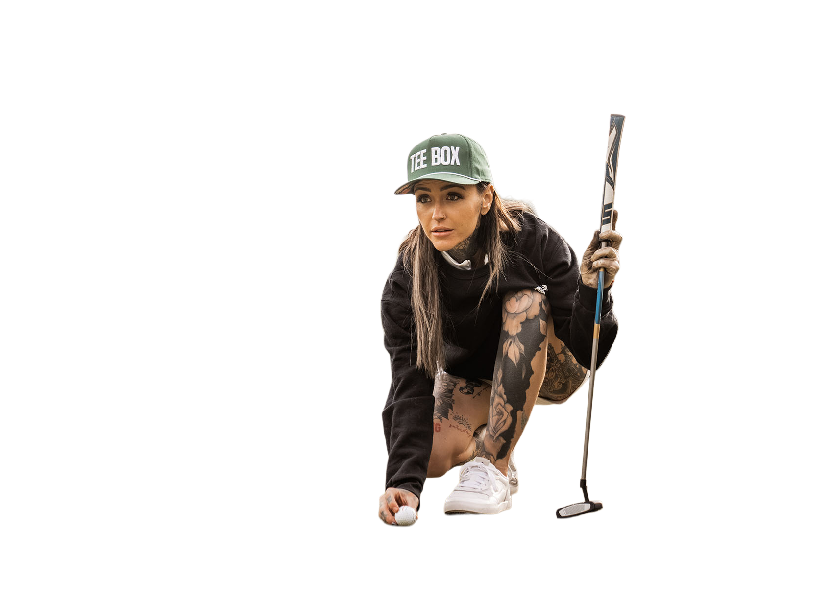 An image of golfer Taylor Nicole lining up a shot on a green in Gilbert, AZ.