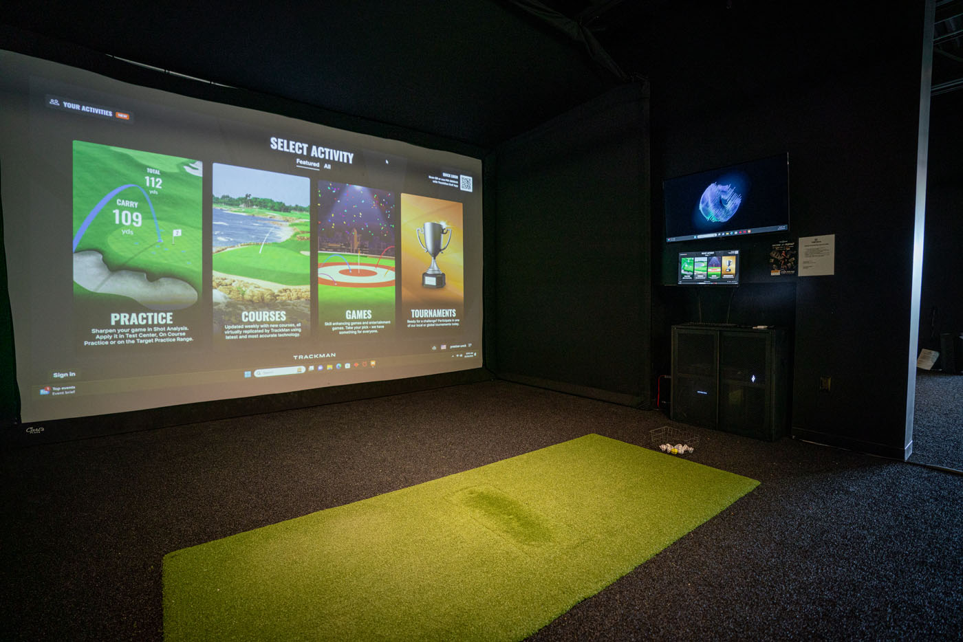 A Tee Box virtual indoor golf bay.