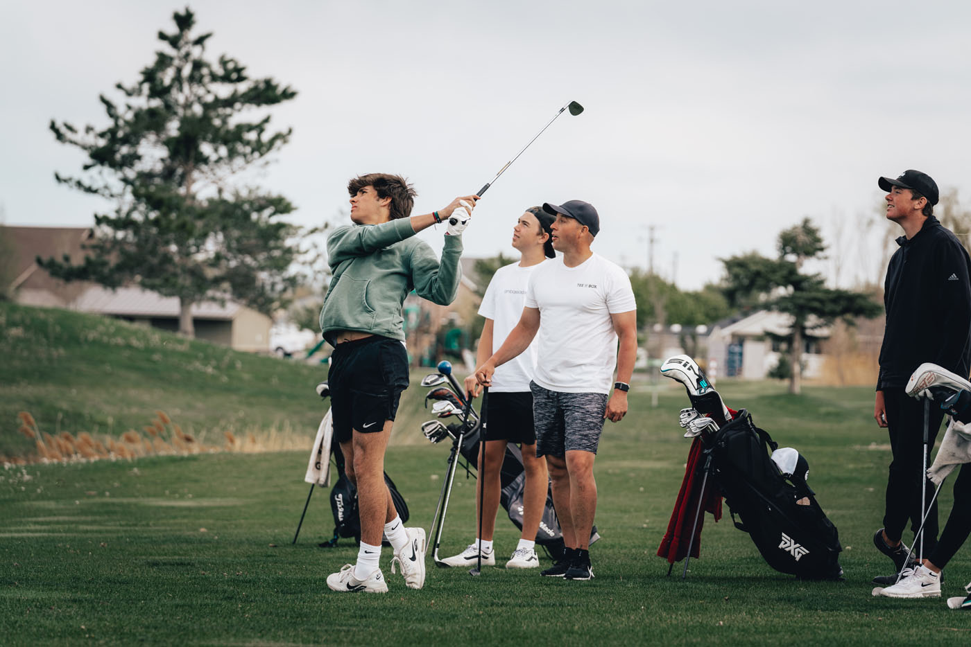 A Tee Box St. George member playing golf at an outdoor golf course.